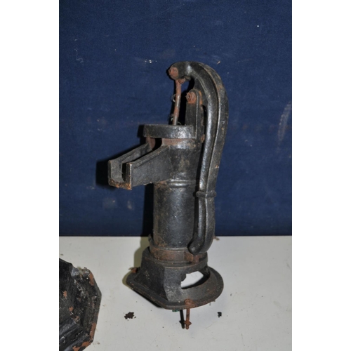 1060 - A SMALL CAST IRON WATER PUMP 41cm high, two cast iron rain hoppers, a Tilly lamp, a small paraffin l... 