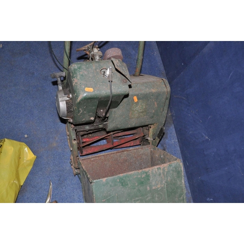 1061 - A VINTAGE ATCO PETROL CYLINDER MOWER with grass box and a bag containing spare parts( engine pull fr... 