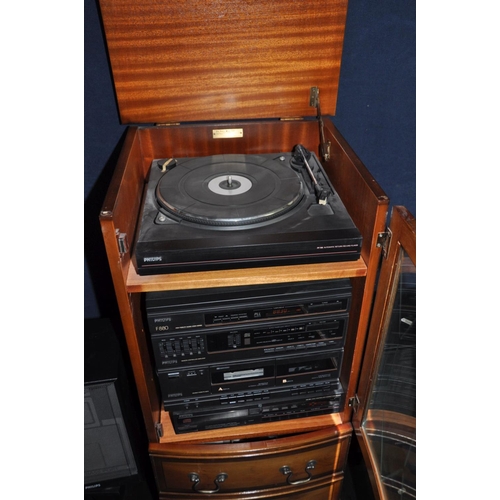 1063 - A CHERRY WOOD HI FI CABINET by the Table Company containing a Philips F880 hi fi, a CD380 CD player,... 