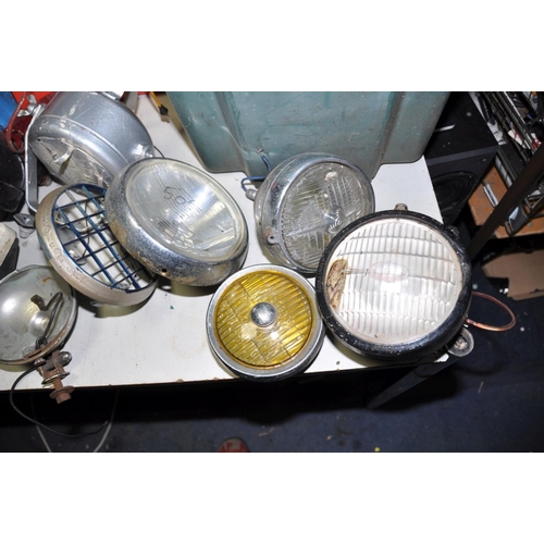 1072 - A QUANTITY OF VINTAGE VEHICLE HEADLAMPS, TAILLIGHTS, air and oil filters, timing belt, motorbike dia... 