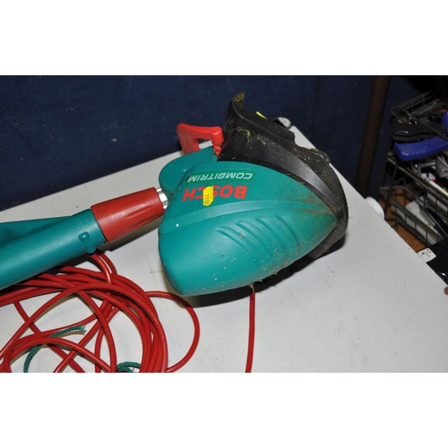 1100 - TWO BOSCH ART23 COMBITRIM STRIMMERS both with line Strim and fixed cutting line attachments ( both P... 