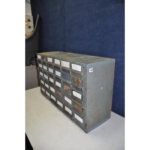 1102 - AN INDUSTRIAL METAL WORKSHOP DRAWER UNIT with thirty plastic 'Well construct' drawers , width 90cm d... 