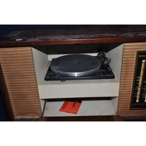 1121 - AN EKCO SRG 412 VINTAGE VALVE STEREOGRAM  in walnut case, tapered legs and Garrard SP25Mk5 turntable... 