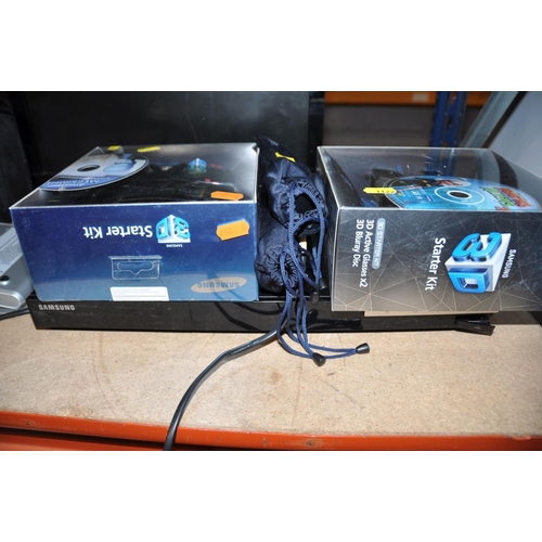 1122 - A SONY KDL-19BX200 19ins TV, a Samsung Blu-ray player with two boxed 3D glasses and a loose pair of ... 