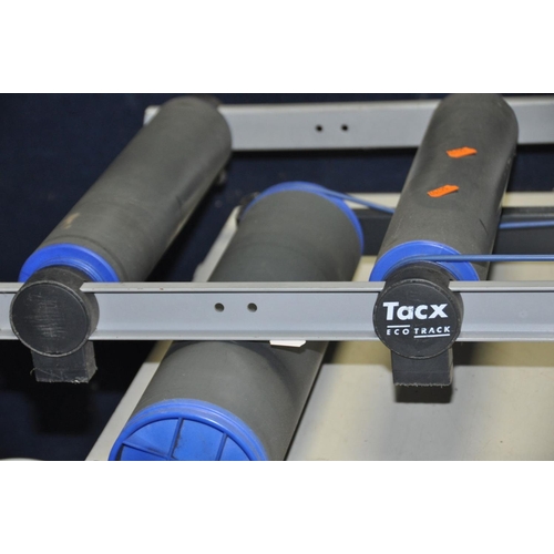 1127 - TWO CYCLE TRAINING ROLLERS one by Tacx 130cm long the other unbranded and 125cm long with bigger rol... 