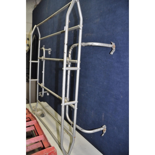 1129 - TWO PAIRS OF CAR RAMPS and a vintage Mini Clubman roof rack  width 110cm between fixings but adjusta... 