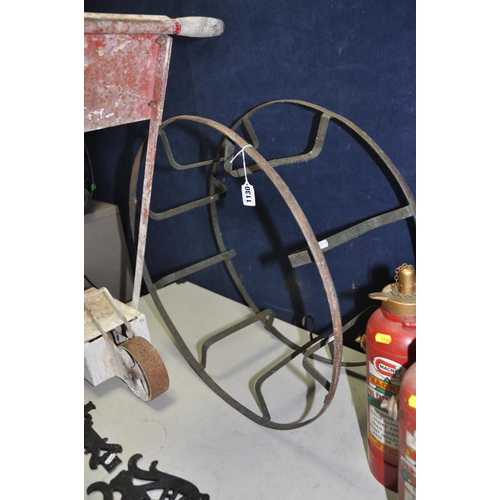 1130 - A VINTAGE IRON SPORTS PITCH LINE MARKER, a vintage iron hose reel 67cm in diameter, three vintage Ma... 