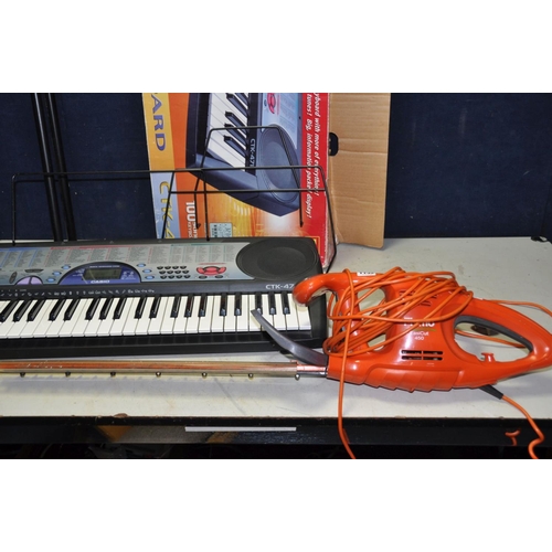 1132 - A FLYMO EASICUT 450 ELECTRIC HEDGE TRIMMER and a Casio CTK 471 electronic keyboard with box, power s... 