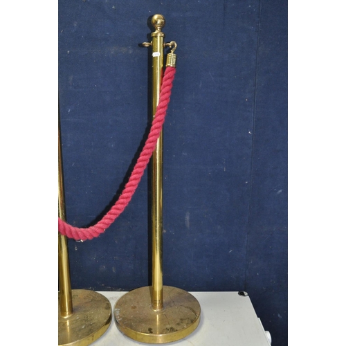 1140 - A SET OF SIX BRASS PEDESTAL ROPE BARRIERS with 4 ropes ( maybe brassed and brass)