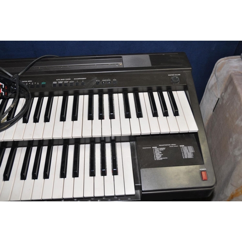 1146 - A YAMAHA ELECTONE EL7 ELCTRIC ORGAN with bass pedals and two keyboards ( PAT pass and working) all k... 