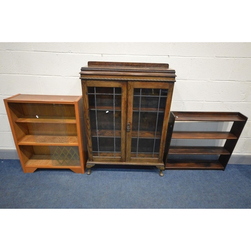 1196 - AN EARLY 20TH CENTURY OAK BOOKCASE, raised back, lead glazed effect doors enclosing two adjustable s... 