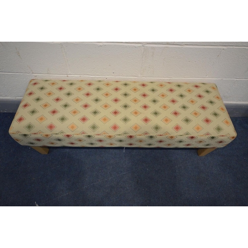 1203 - A LONG UPHOLSTERED FOOTSTOOL, length 125cm