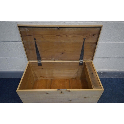 1209 - A VICTORIAN PINE BLANKET BOX, with strap hinges and a candle box, with Art Nouveau handles, width 84... 