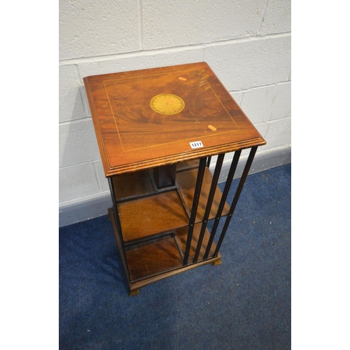 1217 - A LATE 20TH CENTURY MAHOGANY AND INLAID REVOLVING BOOKCASE, with two tiers on small bracket feet, wi... 