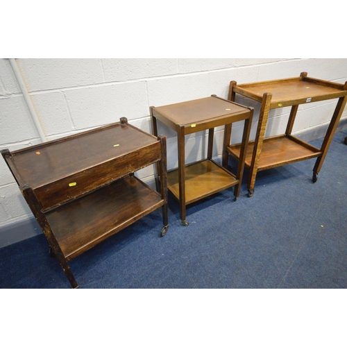 1219 - TWO OAK TWO TIER TEA TROLLEYS and a walnut tea trolley (condition - one trolley missing drawer) (3)