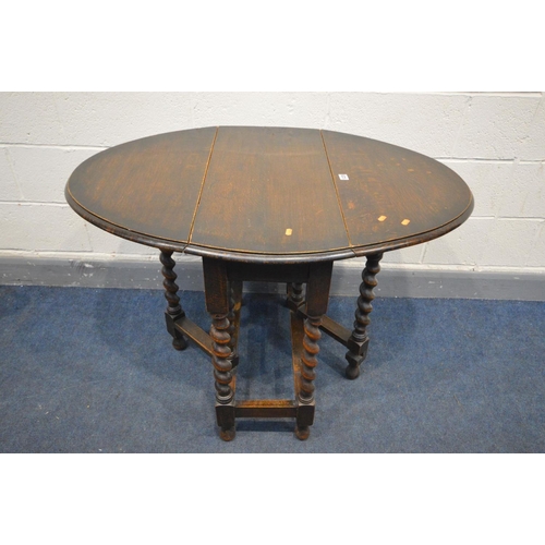 1225 - A SMALL EARLY 20TH CENTURY OAK BARLEY TWIST GATE LEG TABLE, open length 105cm x closed length 37cm x... 