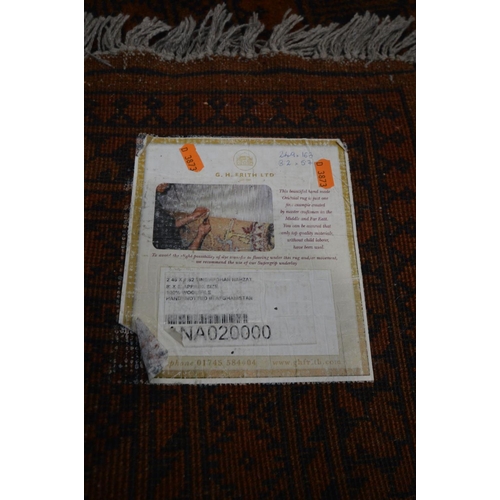 1232 - A HAND WOVEN NAHZAT RUSSET GROUND RUG, 250cm x 166cm