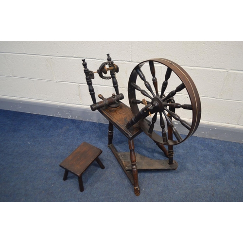 1237 - AN OAK SPINNING WHEEL constructed from repurposed Georgian and later timbers together with a foot st... 