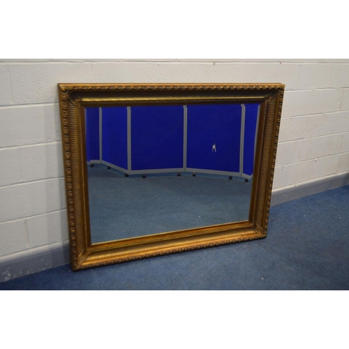 1238 - A LARGE RECTANGULAR GILTWOOD BEVEL EDGED WALL MIRROR, width 149cm x height 119cm x depth 85cm