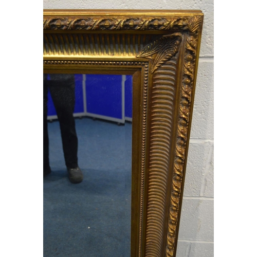 1238 - A LARGE RECTANGULAR GILTWOOD BEVEL EDGED WALL MIRROR, width 149cm x height 119cm x depth 85cm