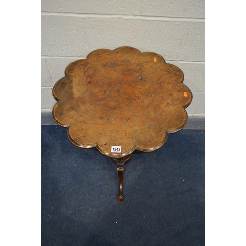 1243 - AN LATE VICTORIAN WALNUT TRIPOD TABLE, with a carved wavy top, triple supports and splayed legs, dia... 