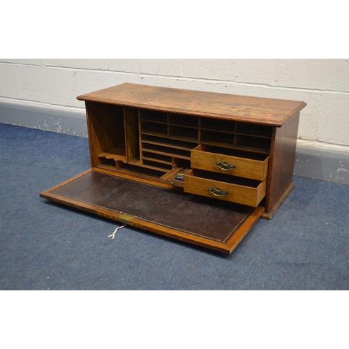 1252 - AN OAK TABLE TOP SECRETAIRE CABINET, with a fall front door with internal Burgandy leather inlay enc... 