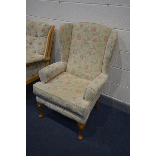 1268 - AN UPHOLSTERED WING BACK ARMCHAIR, and a similar beech framed armchair (2)