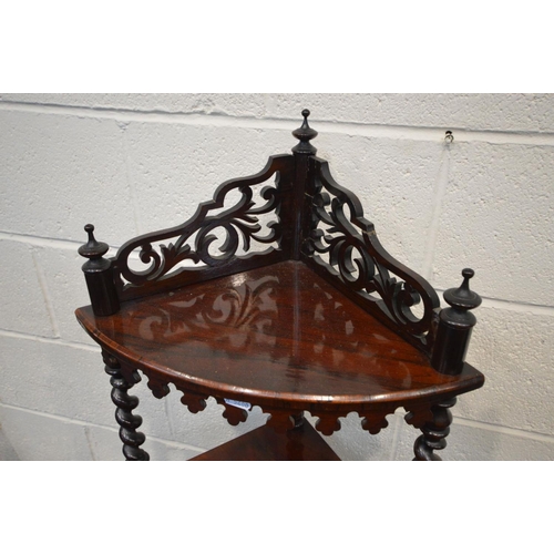 1271 - A VICTORIAN ROSEWOOD FOUR TIER WHAT NOT, raised pierced back, barley twist supports, finials and apr... 