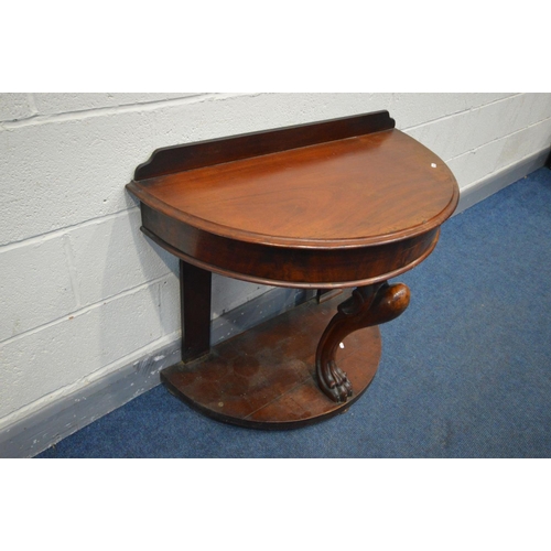 1285 - A VICTORIAN MAHOGANY DEMI LUNE DUCHESS WASHSTAND, with a raised back, supported by a central mythica... 