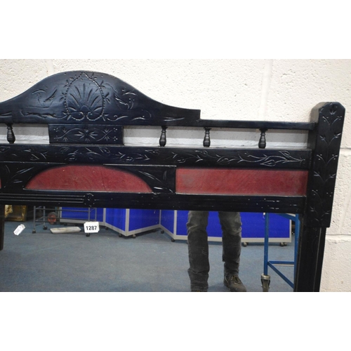 1287 - AN EDWARDIAN EBONISED OVERMANTEL MIRROR, 127cm x 103cm