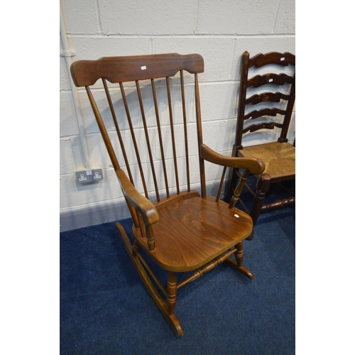 1290 - A SET OF SIX OAK RUSH SEATED LADDERBACK CHAIRS, all chairs varnished differently, along with spindle... 