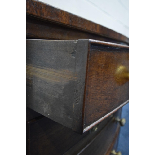 1295 - A 20TH CENTURY GEORGIAN STYLE MAHOGANY AND CROSSBANDED BOW FRONT BACHELORS CHEST, of four  drawers, ... 