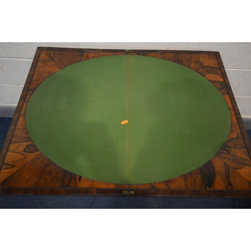 1299 - A REGENCY ROSEWOOD CARD TABLE, the fold over top enclosing an oval baize playing surface, single fri... 