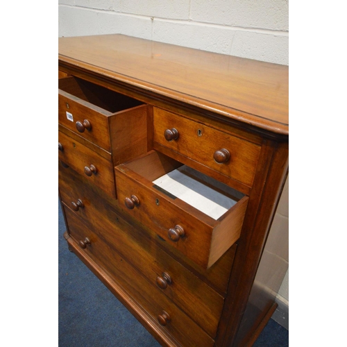 1305 - A VICTORIAN WALNUT CHEST OF EIGHT ASSORTED DRAWERS, with turned handles, width 118cm x depth 52cm x ... 