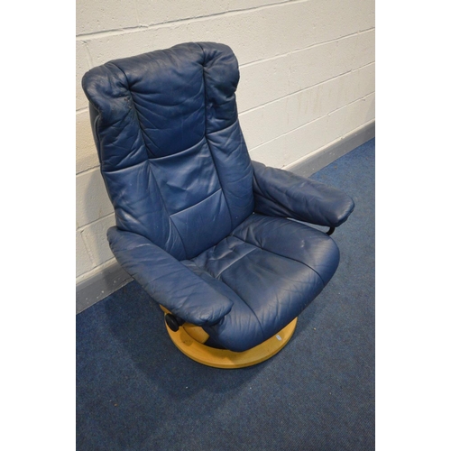 1331 - AN EKORNES STRESSLESS BLUE LEATHER SWIVEL RECLINING CHAIR, with a matching footstool (this suite doe... 