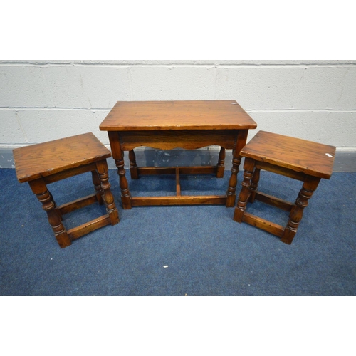 1332 - A REPRODUCTION GEORIGAN STYLE OAK COFFEE/NEST OF THREE TABLES