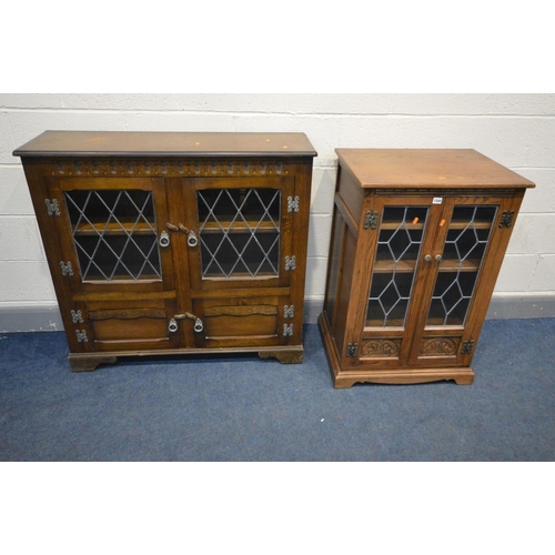 1344 - AN OAK OLD CHARM HIFI CABINET, with double lead glazed doors and an oak double door lead glazed book... 