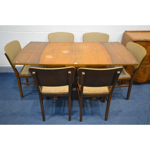 1376 - A 1940'S WALNUT DINING SUITE, comprising an draw leaf table, six chairs and a sideboard (8)