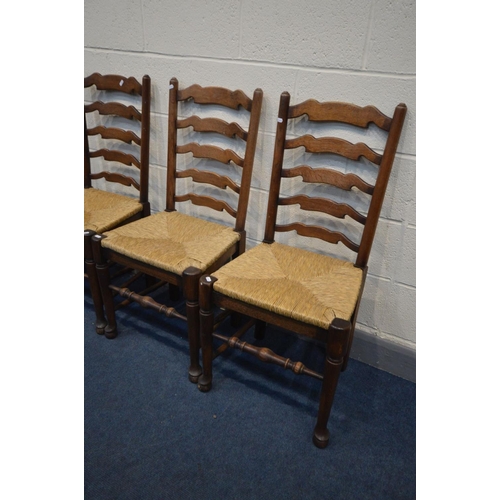 1393 - A SET OF SIX OAK LADDERBACK DINING CHAIRS, with rush seats, along with a pair of beech chapel chair ... 