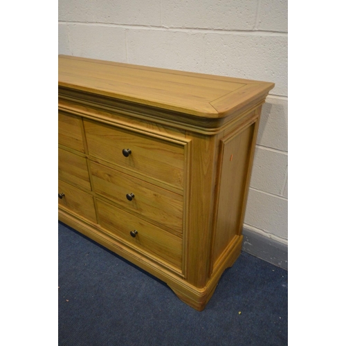 1398 - A SOLID OAK FRENCH STYLE SIDEBOARD/CHEST OF SIX DRAWERS, width 129cm x depth 46cm x height 90cm