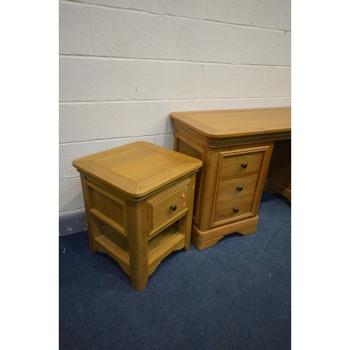 1399 - A SOLID OAK FRENCH STYLE DRESSING TABLE, with three drawers and a single door cupboard, width 152cm ... 