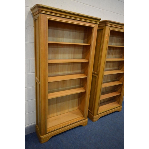 1400 - A PAIR OF SOLID OAK FRENCH STYLE OPEN BOOKCASES, each with four adjustable shelves, width 101cm x de... 