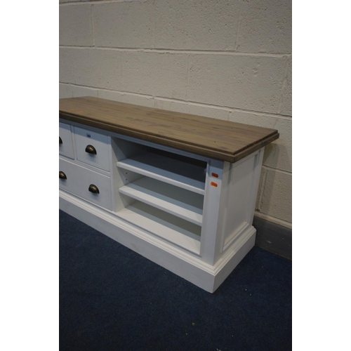 1404 - A PARTIALLY PAINTED AND HARDWOOD TOPPED TV STAND with three drawers and open shelves, width 120cm x ... 