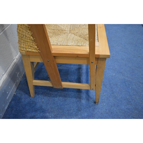 1415 - A LATE 20TH CENTURY BEECH ORKNEY CHAIR, woven wicker back and drop in seat pad, width inner width 48... 