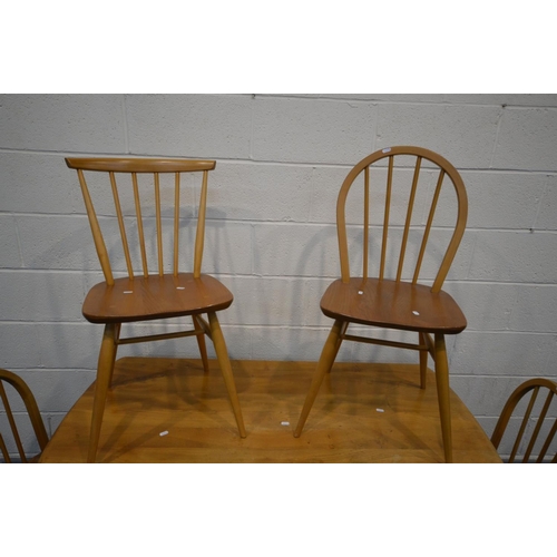 1417 - AN ERCOL BLONDE ELM AND BEECH RECTANGULAR TABLE, on splayed legs united by a single stretcher, width... 