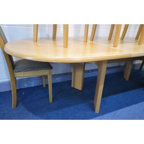 1422 - A SKOVBY LIGHT OAK EXTENDING DINING TABLE with rounded ends, with two single leaves, open width 275c... 