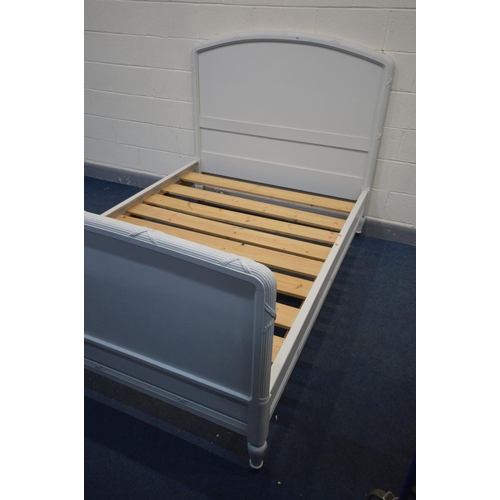 1432 - A 4FT6 BEDSTEAD, later painted, on bulbous legs and metal casters, with slats and side supports, wid... 