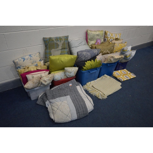 1433 - A COLLECTION OF CUSHIONS in various styles, sizes and colours together with two throws and a table c... 