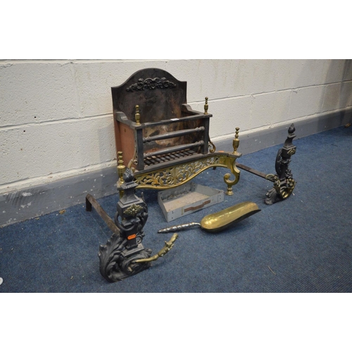 1435 - A CAST IRON AND BRASS FIRE GRATE with foliate brass apron and finials, width 63cm x depth 29cm x hei... 