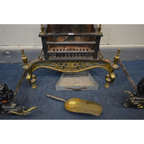 1435 - A CAST IRON AND BRASS FIRE GRATE with foliate brass apron and finials, width 63cm x depth 29cm x hei... 